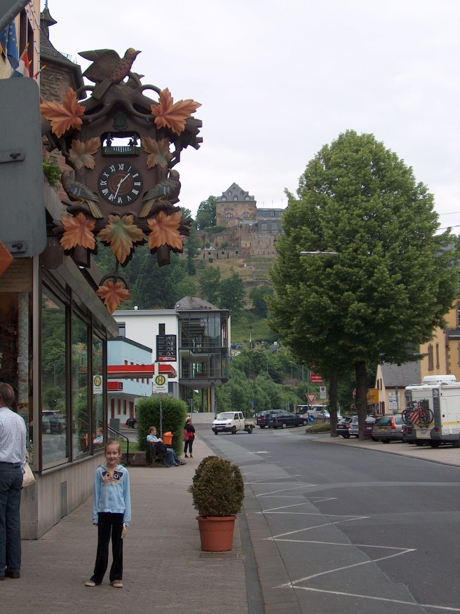 Giant Cuckoo Clock on the Rhine River in Germany--looking out on new shops and very old castles.