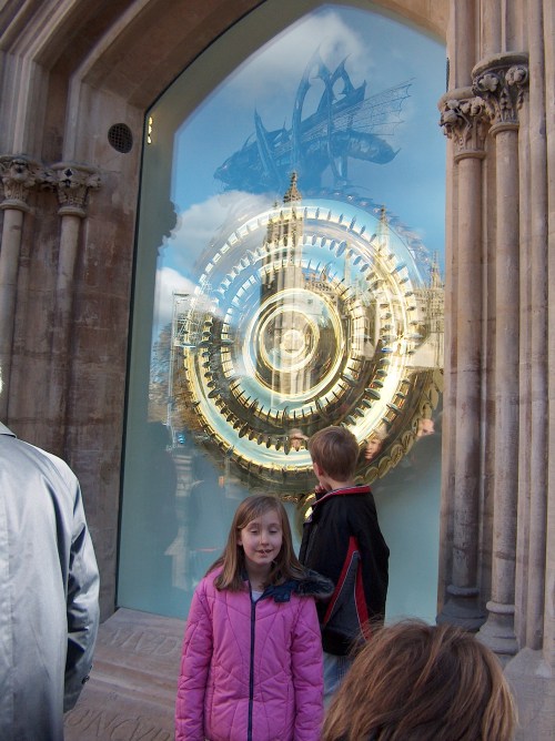 The fabulous Corpus Clock in Cambridge, England--revealing less of itself in the gleaming sun and more of a reflection of King's College.