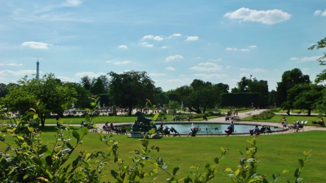 Eiffel Tower watching over the Tuileries at a distance.