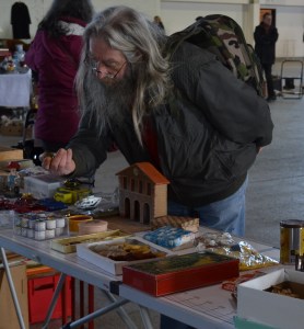 Our wizard friend shops the stalls of Diagon Alley. . . ur, Metz market.