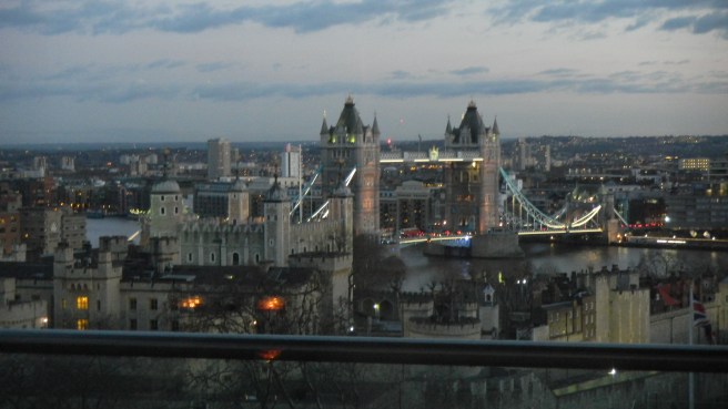 Tower Bridge, just beyond the Tower of London, as the sun goes down. February 2016